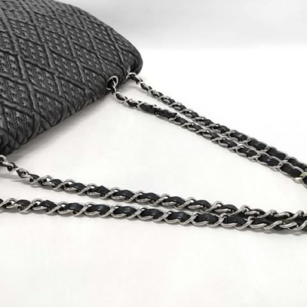 Chanel - Black Quilted Flap Diamond Stitch
c: Early 2000s - Picture 2 of 4